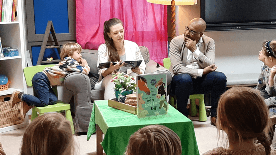 A photo of me teaching a class of young kids about AI and satellites.