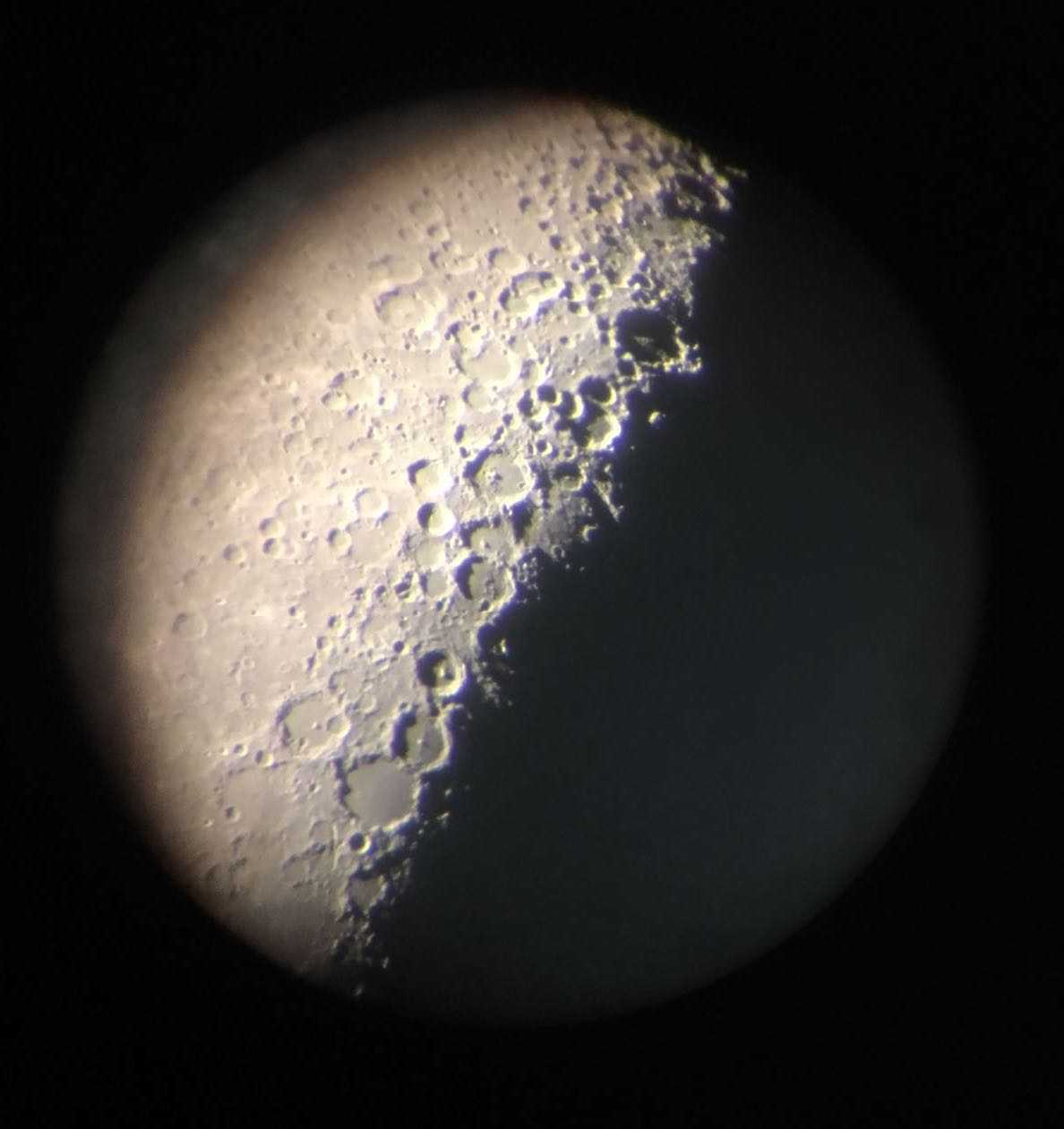 Photo: a photo of the moon taken with my mobile phone through the 10-inch telescope at the Old Observatory.